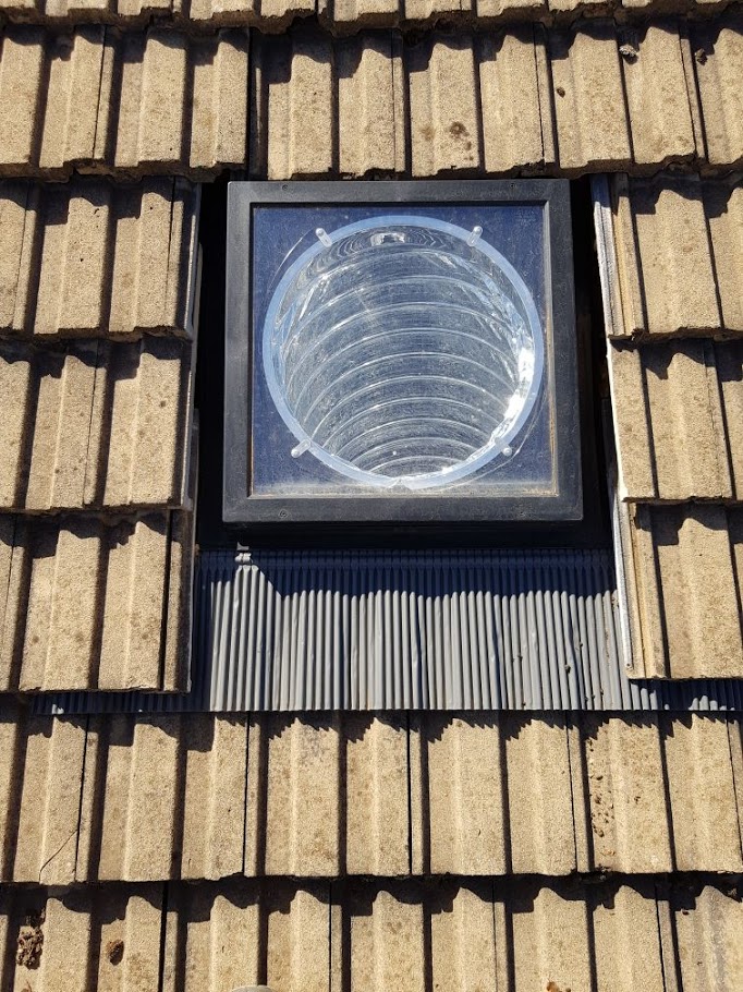 sun tunnel installed in tile roof